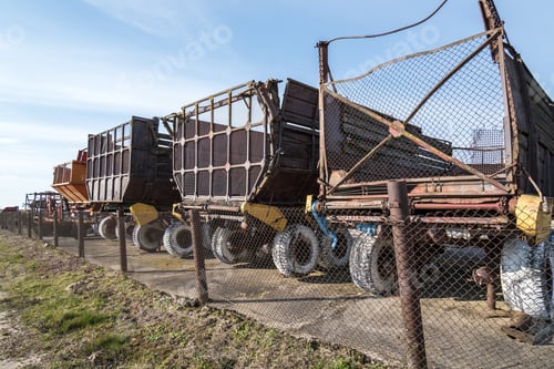 Preview: Parking agricultural machinery and harvest. rows of plows, cultivators, bodies