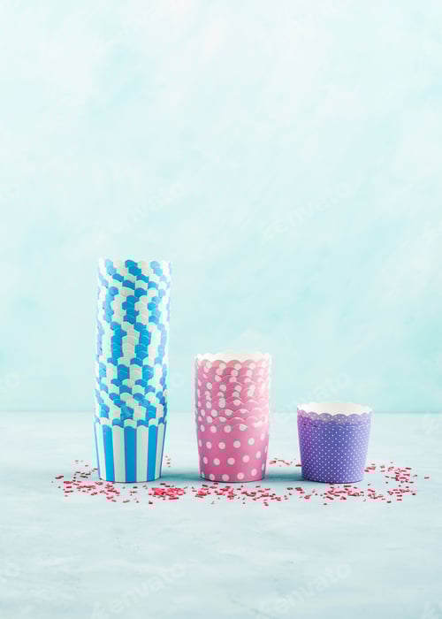 Preview: Colorful Cupcake Liners and Sprinkles on Light Background