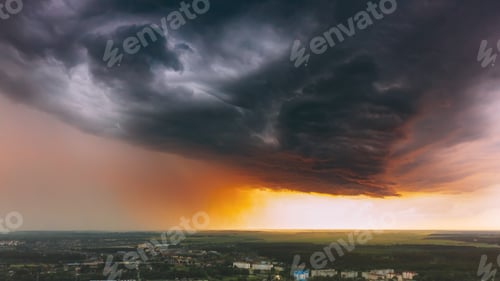 Preview: Stormy Sunset Sky Before Rain Above Skyline. Dramatic Cloudy Sky And Flash Light