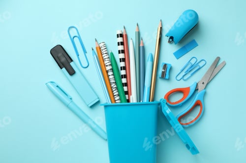 Preview: Holder in the form of trash can with stationery on blue background