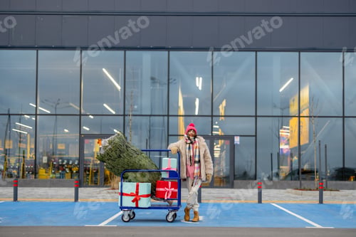 Preview: Woman buys Christmas tree and presents at mall
