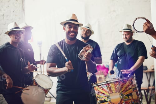 Preview: Shot of a group of musical performers playing drums together