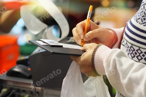 Preview: People signing on shopping bills in winter seasons