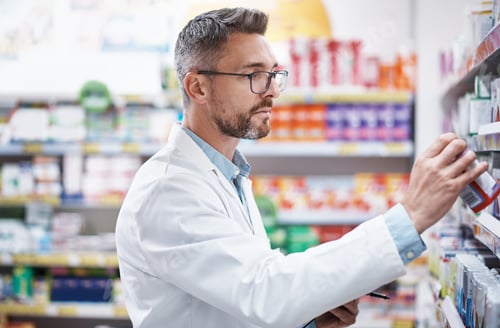 Preview: Stocked with only the best. Shot of a mature pharmacist doing inventory in a pharmacy.