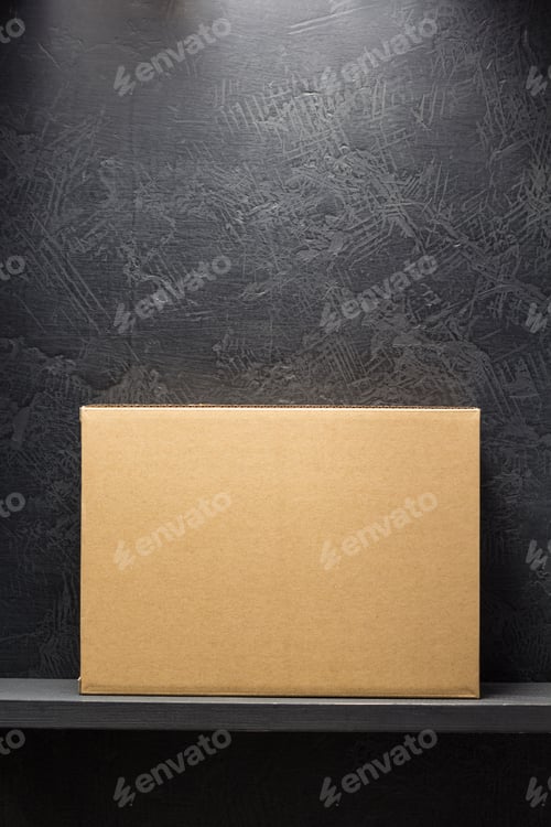 Preview: cardboard box on black background