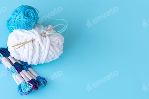 Preview: Craft Supplies for Knitting on Light Blue Background