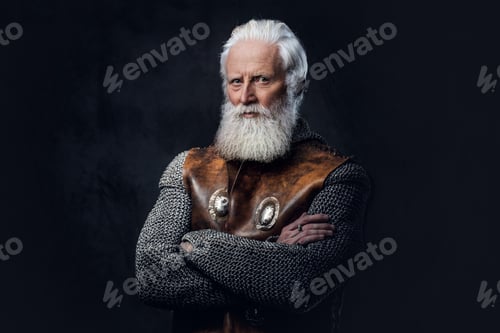 Preview: Confident elderly knight with crossed arms against dark background