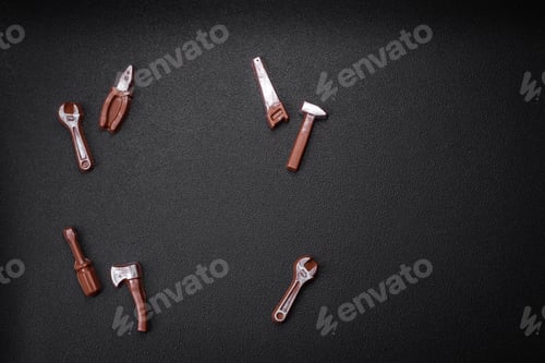 Preview: Tools and inscriptions symbolizing repairs or a garage and its attributes on a plain background