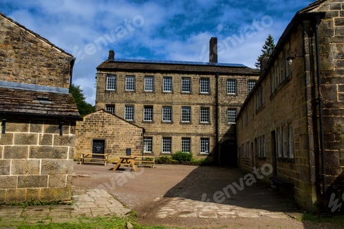 Preview: Landscape of stone Gibson Mill Museum in Calder Valley England under blue sky