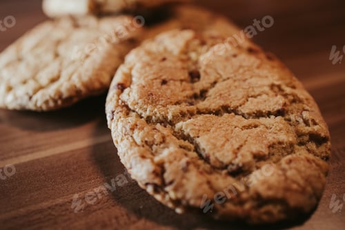 Preview: Closeup shot of baked cookies on a wooden surface
