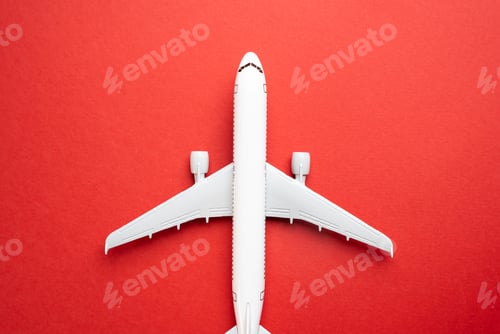 Preview: Airline plane top view on red background. Passenger transportation.