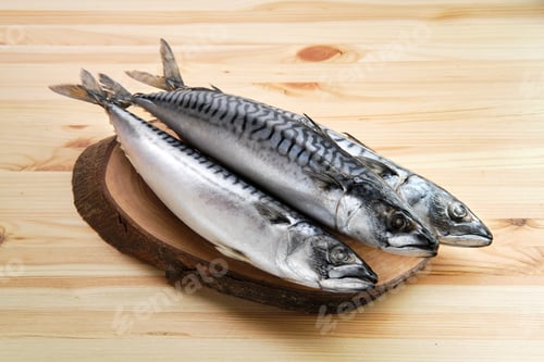 Preview: Frozen mackerel on wooden plate
