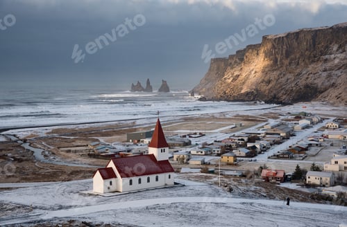 Preview: Icelandic village of Vik, with the Myrdal church at the top of the hill. Iceland Europe