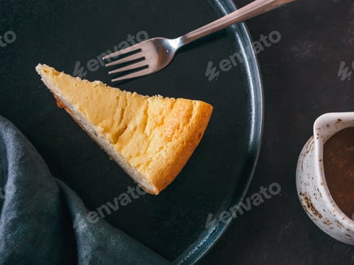 Preview: Classic Cheesecake on dark background. Top view