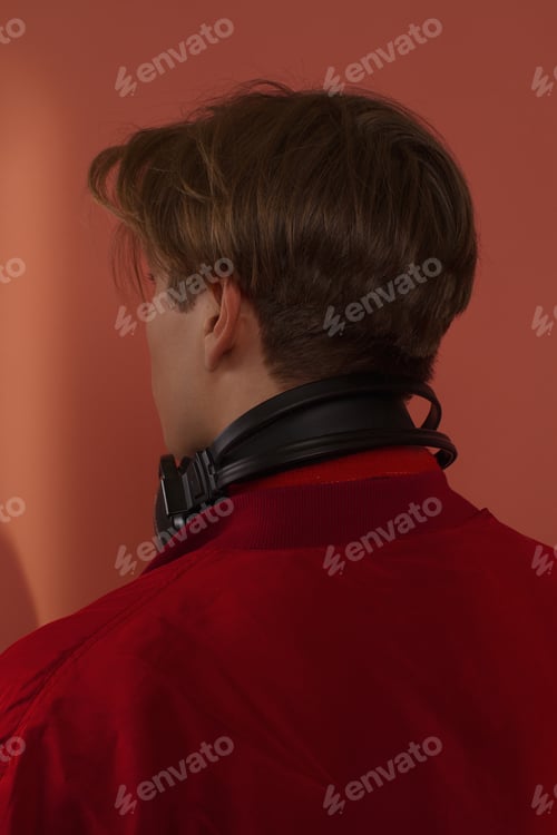Preview: A Guy Hipster In A Sports Suit Posing On A Pink Background