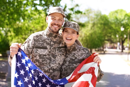 Preview: Military couple with American flag in park