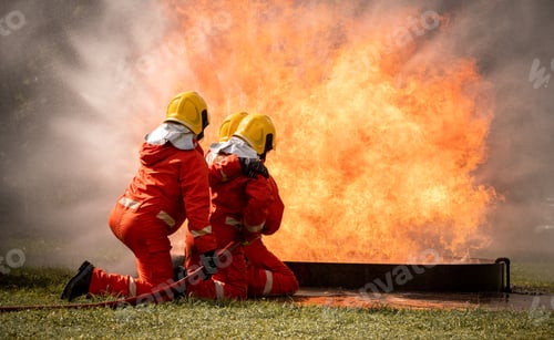 Preview: Firefighters safety using twirl water fog type fire extinguisher to fighting with fire from oil and