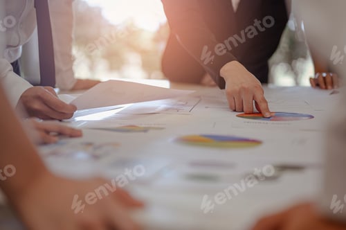 Preview: Business spends time planning a new financial project with team brainstorming while sitting.