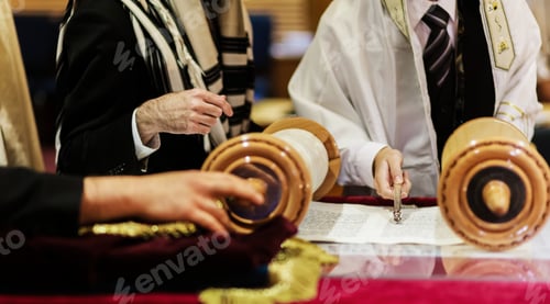 Preview: Hand of boy reading the Jewish Torah at Bar Mitzvah reading Jewish books
