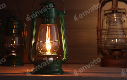 Preview: Vintage kerosene metal lamps on wooden table