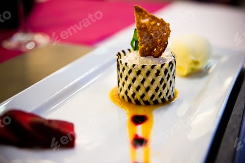 Preview: Desserts with fruits, biscuit mousse plated at a wedding.