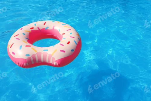 Preview: Inflatable ring floating in swimming pool on sunny day. Space for text
