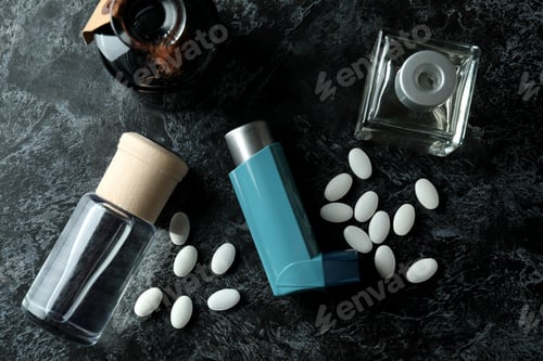 Preview: Asthma treatment accessories on black smokey table