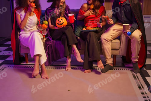Preview: An African American woman a white woman celebrate coworkers, drinking,having fun smiling together