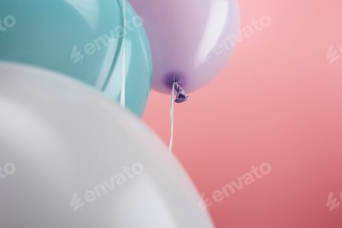 Preview: close up view of decorative colorful balloons on pink background