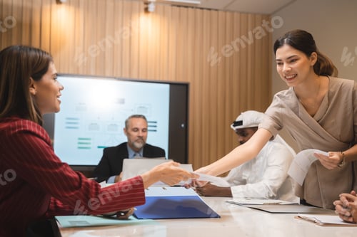 Preview: diverse business team leader discuss financial paperwork, Smart businessman and businesswoman