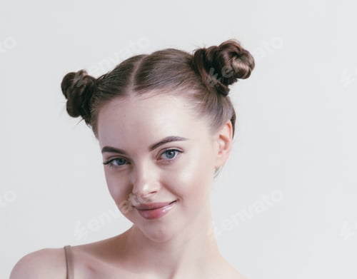 Preview: Woman with Brown Hair in Space Buns Hairstyle