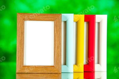Preview: front view different picture frames with colored corners on a green background family memory glass