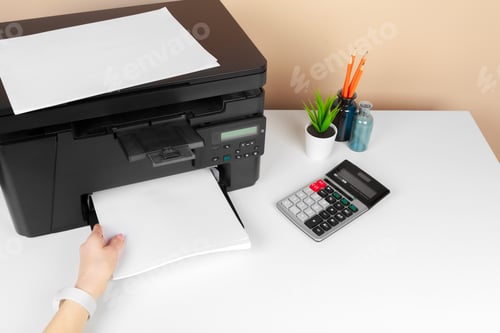 Preview: Woman using the printer to scanning and printing document