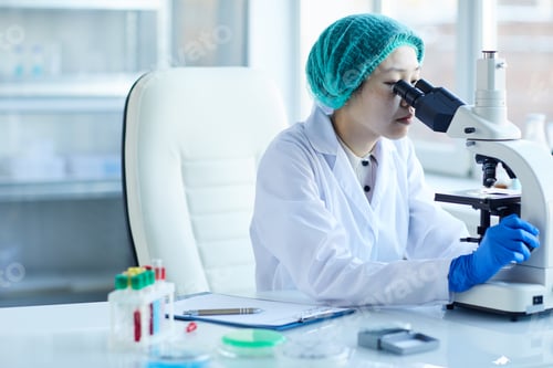 Preview: Doctor examining samples at office