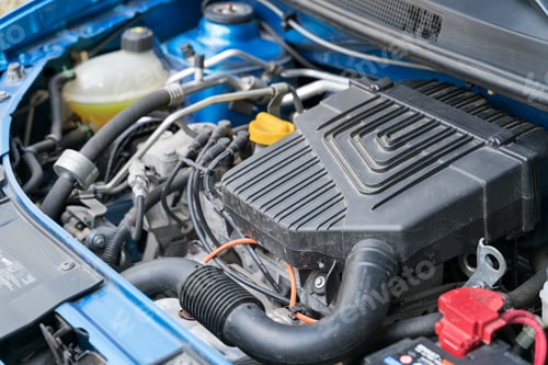 Preview: View of the open hood of the car