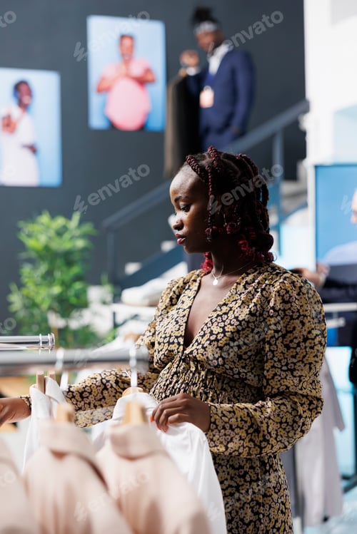 Preview: Pregnant customer checking new fashion collection