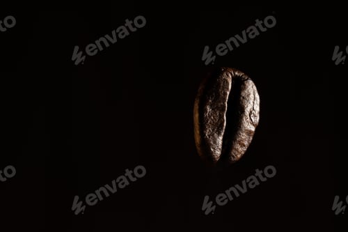 Preview: Coffee beans close-up, isolated on black background