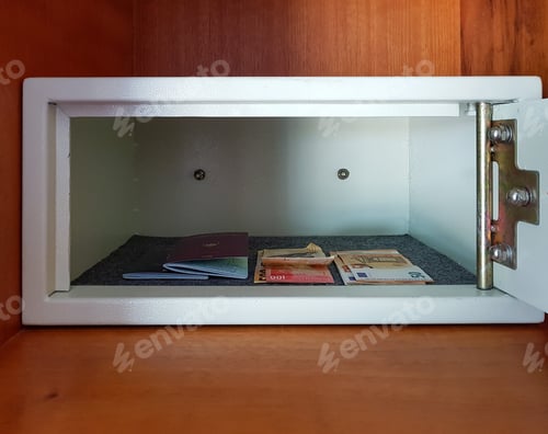 Preview: Opened safe with money, cash and passports.