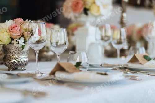Preview: Beautiful table served with glassware and cutlery, decorated with flowers