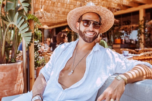Preview: Handsome young man happy smiling at terrace bar at summer