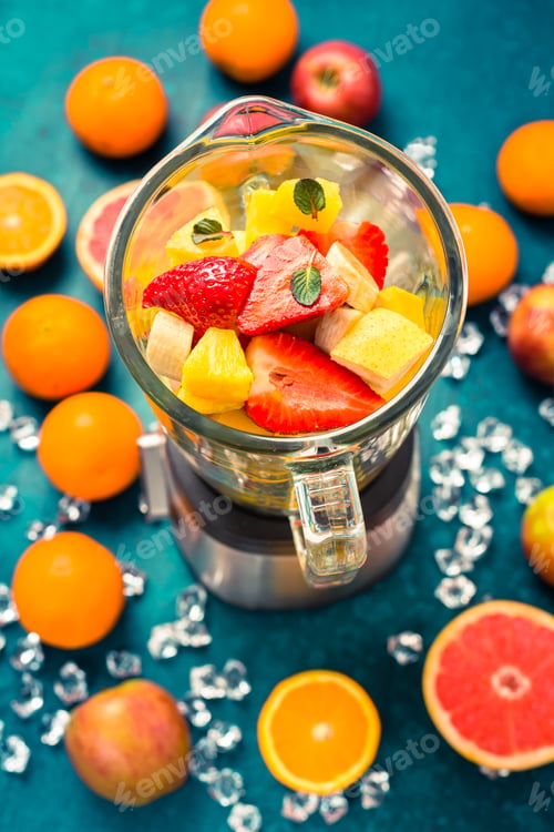 Preview: Variation of fruits in mixer. Preparing milkshake or smoothie