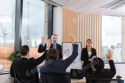 Preview: Diverse colleagues gather in brainstorm discuss statistics together.