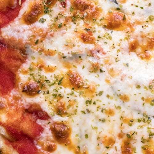 Close-Up of a Delicious, Melted Cheese Pizza