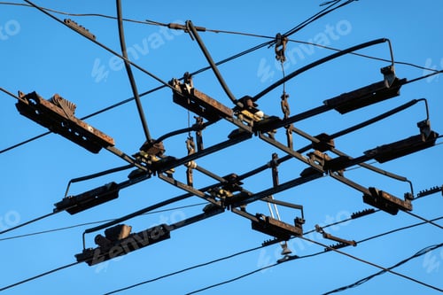 Preview: Iron wires for trolleybus driving way in Chisinau, Moldova over blue sky