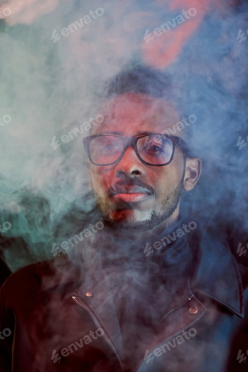 Preview: Portrait of Stylish Black Man in Cloud of Smoke