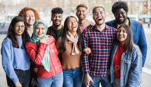 Preview: Young diverse people having fun outdoor laughing together - Main focus on gay man face