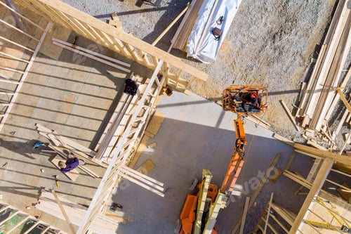 Preview: Wood building frame on new residential construction home framing home boom truck forklift in the new