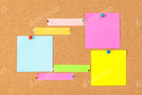 Preview: Cork board with several colorful blank notes with pins