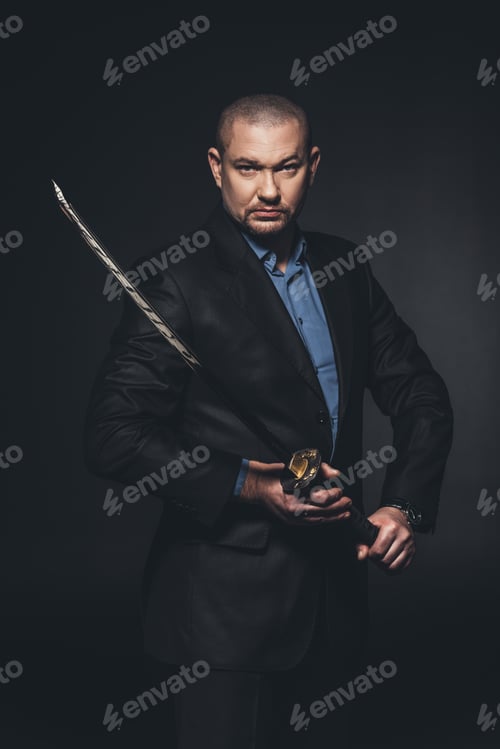 Preview: modern samurai with katana sword on black