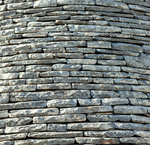 Preview: Ancient trulli wall forming a conic shape in alberobello